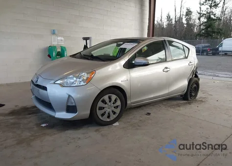 2014 Toyota Prius C Two z USA, uszkodzony, nr VIN JTDKDTB30E1063154